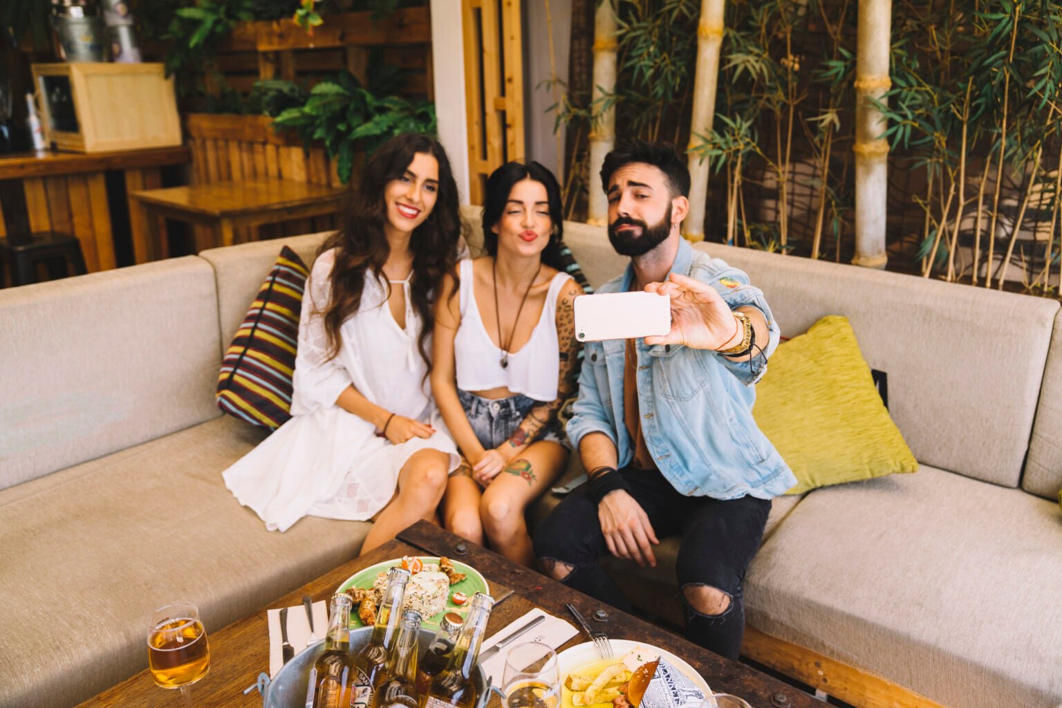 Friends taking selfie sofa 1536x1024