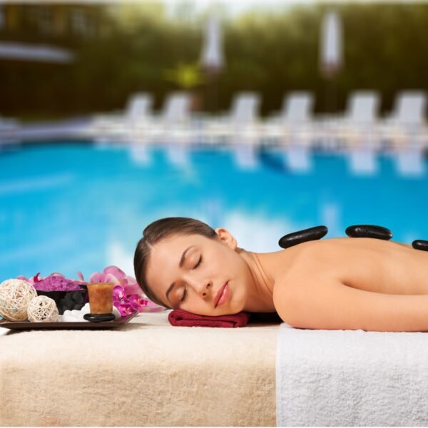 Spa stone massage beautiful woman getting spa hot stones massage spa salon 600x600